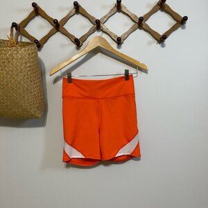 FP Movement by Free People Orange Space Race Bike Shorts